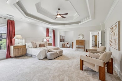 Primary Suite With A Sitting Room With A Built-In Wet Bar, Spa-Style Ensuite, & Dual Closets