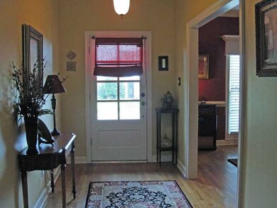 The spacious entry includes nail down hardwood flo