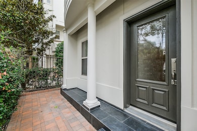 Detailed shot of the front entrance, highlighting the newly updated tile and welcoming architectural features for an inviting curb appeal