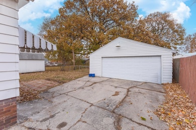2-car detached garage with wood-burning stove