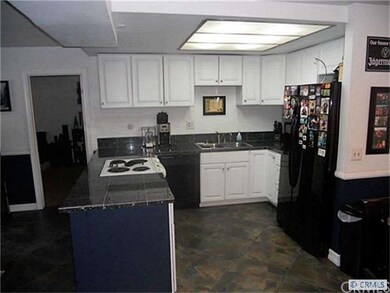 Remodeled Kitchen with Granite Counter Tops