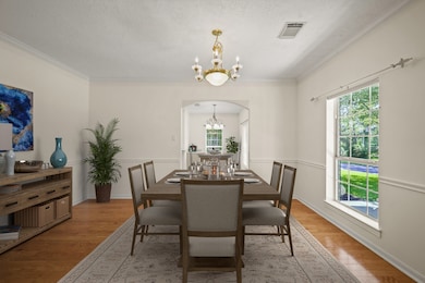 Opposite the formal living room, the formal dining