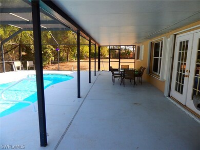 HUGE lanai for entertaining and shade!  (to the ri