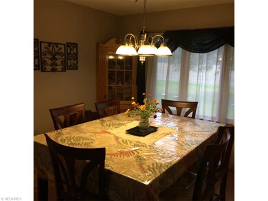 Dining room with built-ins and hardwood floor