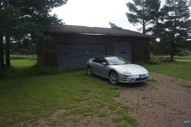 Garage with a lawn