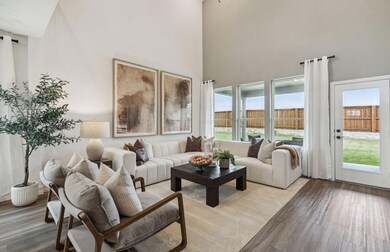 Spacious gathering room *Photos of furnished model