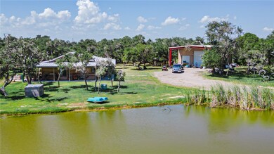 Fishing lake, Ranch style home and barn