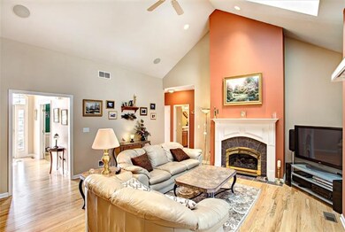 Open floor plan leads to covered porch