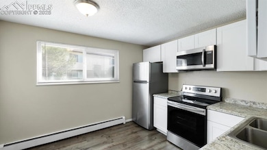 Beautiful kitchen with stainless steel appliances.