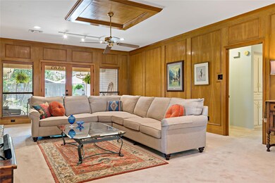 The door to the right is the hallway to the 3 bedrooms.