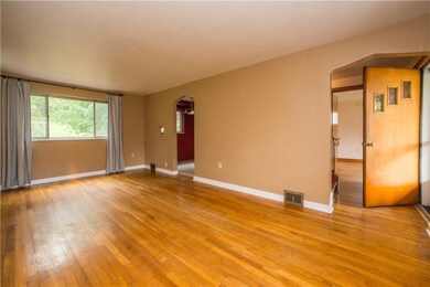 The living room measures a spacious 19x11, large e