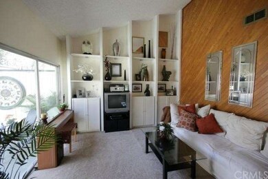 Light & bright living room with vaulted ceiling!