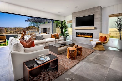 Family Room: Chara - Alta Monte Collection at Tesoro - Photo of Model home.  Not actual home for sale.  Home is still under construction.