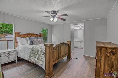 This oversized bedroom is the primary bedroom and leads into the large primary bathroom.