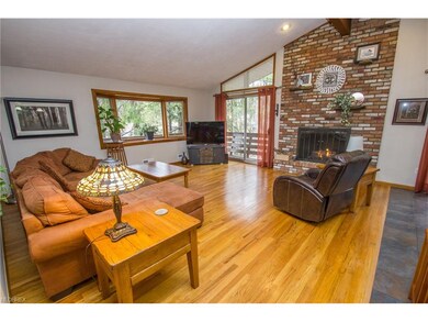 Great Room with hardwood floors and gas log fireplace