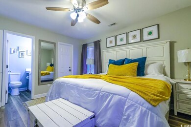 Bedroom with light hardwood / wood-style floors, c