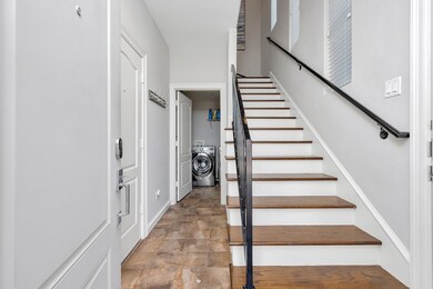 Upon entry you see these beautiful stairs and a la
