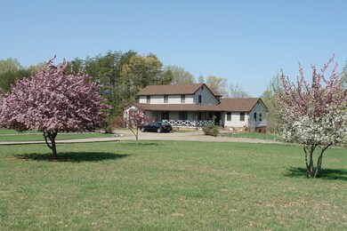 Home with flowering trees in spring