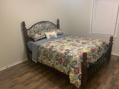 partially furnished bedroom