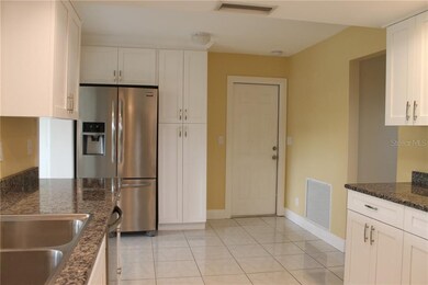 Kitchen with a Pantry Cabinet & French Door Refrig