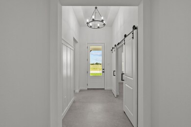Welcoming foyer with feature wall