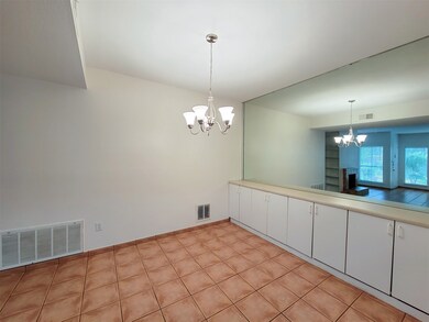 New chandelier, wall of built-in