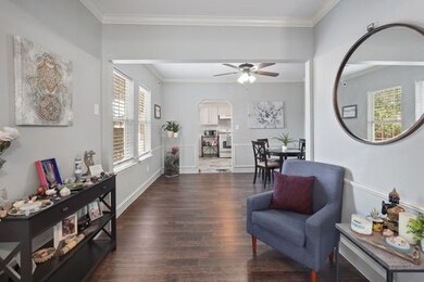 Flexible space leading to the dining and kitchen a