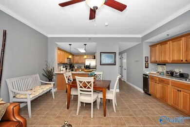 Tile flooring, Crown molding, ceiling fan, 9' ceiling, wet bar with ice maker