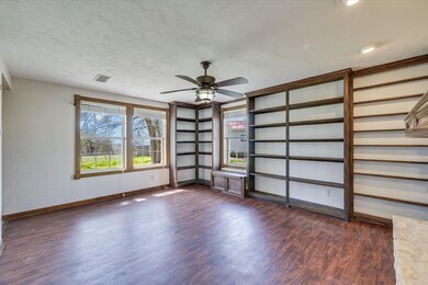 Unfurnished room with a ceiling fan, baseboards, 