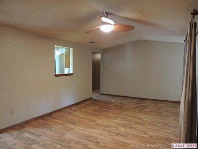 Another view of the family room and the pass throu