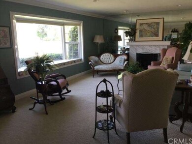 Formal Living Room with Large Bay Window and Seati