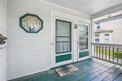 Front porch: left door to 1st floor unit, right do