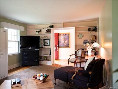 Living Room has Built-in Shelving