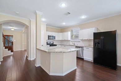 Continue into the kitchen with quartz countertops