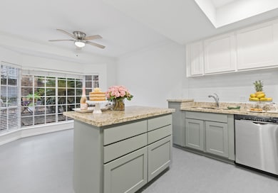 Another view of kitchen. Stainless steel Bosch dis