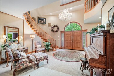 Looking toward front door and entry from the famiy