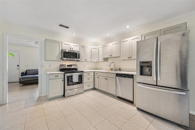 Open kitchen with room for eat in dining space.