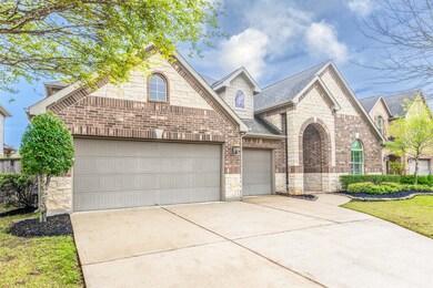 This home features a 3 car-wide garage with extra