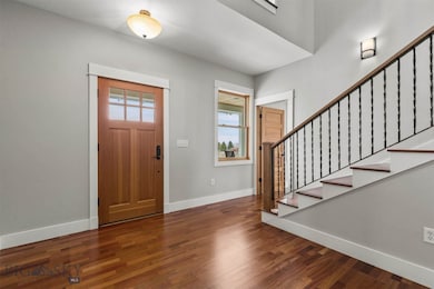 Entry: Warm Welcome Starts with Cherry Wood & Iron