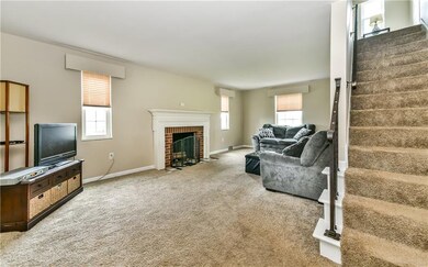 From the Entry the Living Room is to the left.