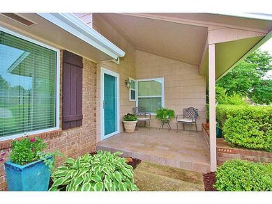Exterior Front. COVERED FRONT PORCH IS TILED