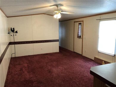 Living Room is open to the Dining and Kitchen area