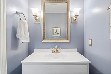 Powder room located conveniently between the entry
