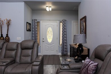 Beautiful entryway with custom drapes.