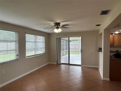 Family room to outside patio, fenced yard
