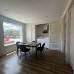 Dining area with visible vents and wood finished f