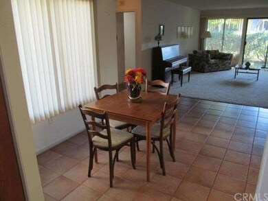 Dining area looking into living room