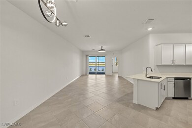 Kitchen featuring visible vents, dishwasher, a sin