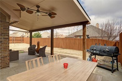 Spacious covered back porch.