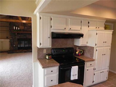 Kitchen. View of family room from kitchen/dining a